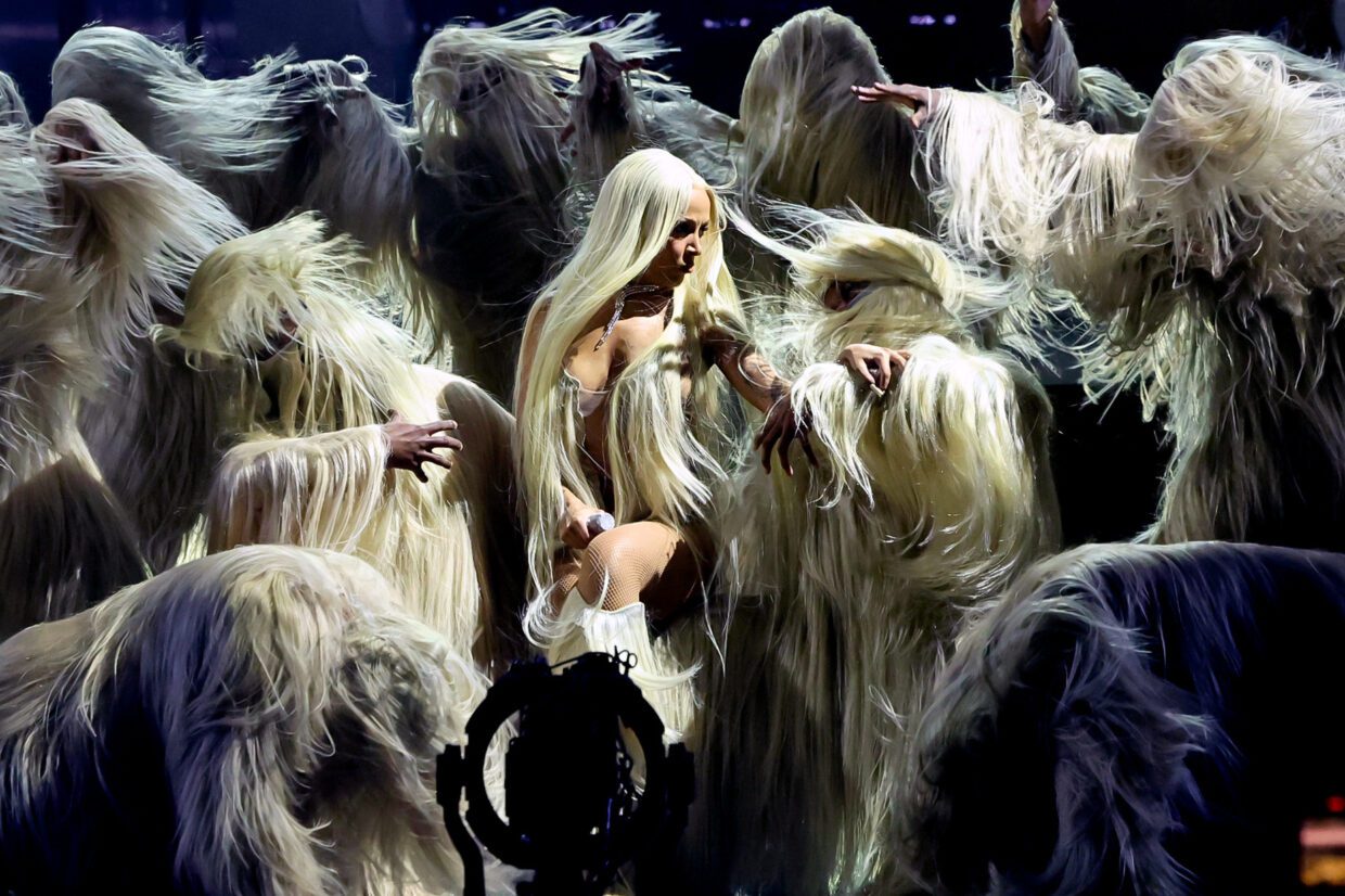 Doja Cat and dancers performing in Charlie Le Mindu's hair costumes.